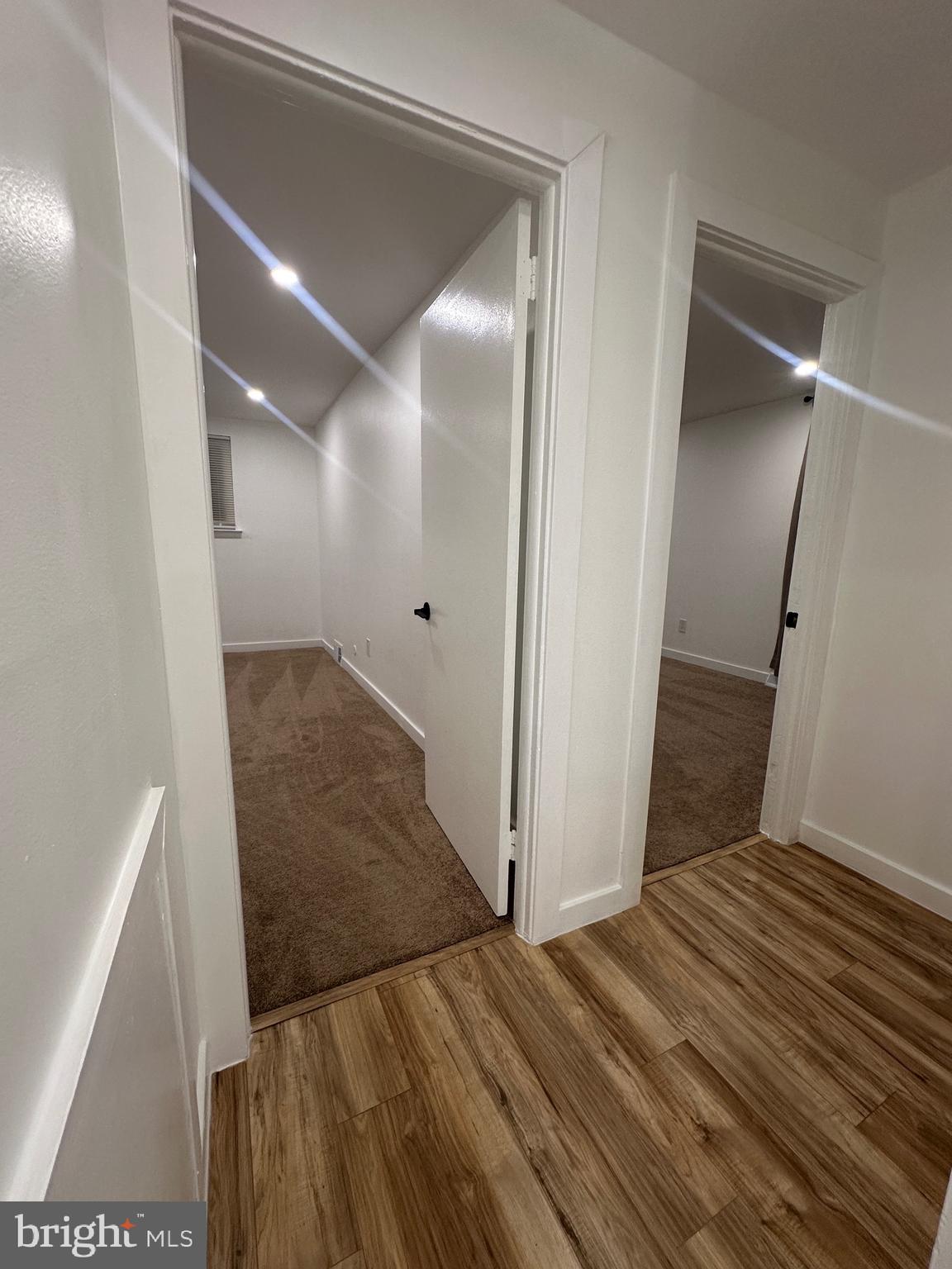 9405 Kirkwood Road Philadelphia, PA 19114 - Photo 21 of 66 a view of a big room with wooden floor and staircase