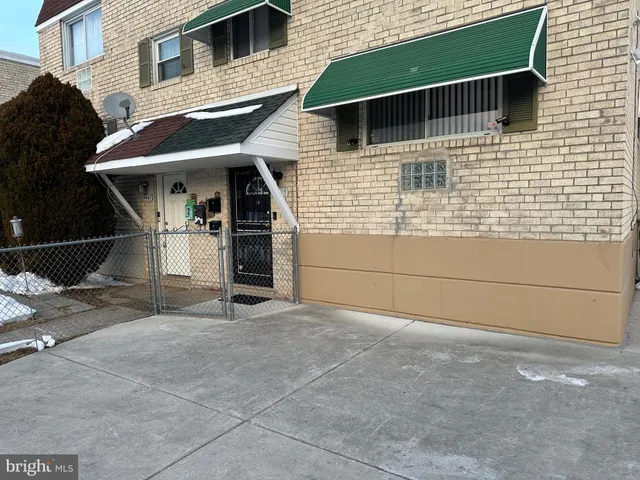 a view of a house with a garage