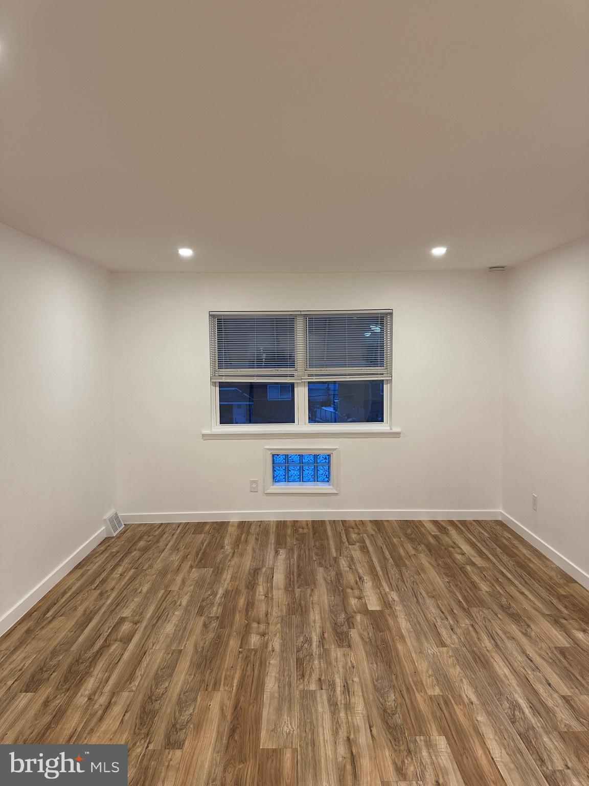 9405 Kirkwood Road Philadelphia, PA 19114 - Photo 35 of 66 a view of empty room with wooden floor