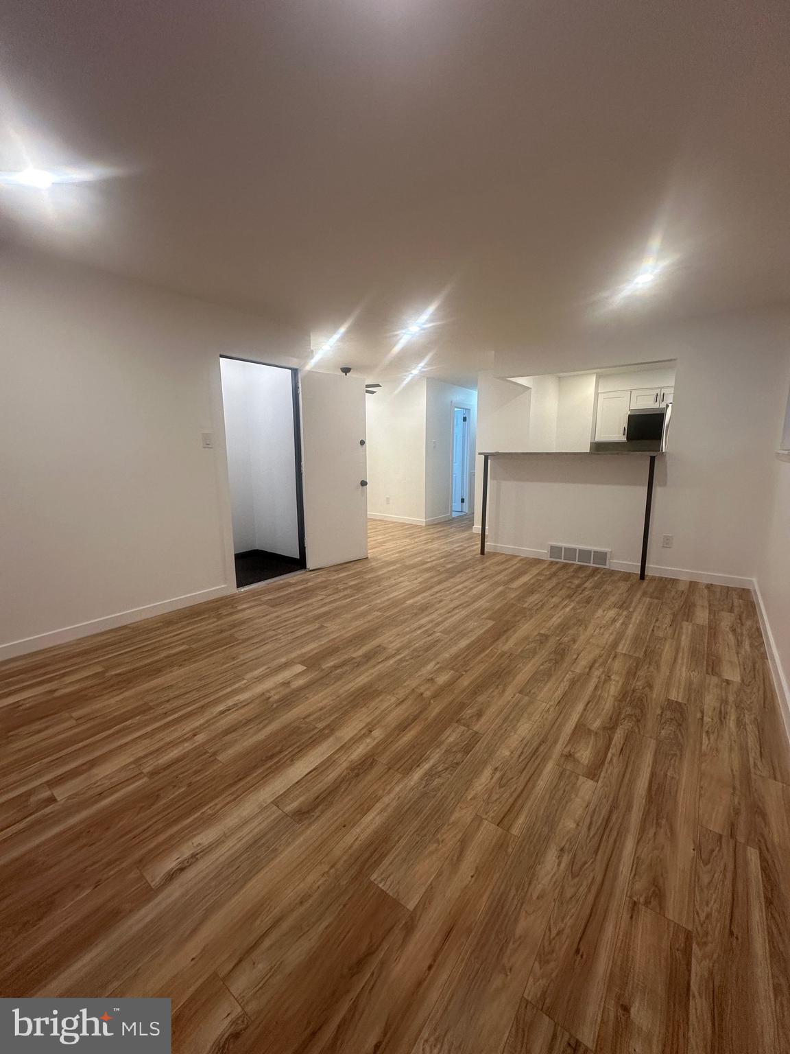 9405 Kirkwood Road Philadelphia, PA 19114 - Photo 36 of 66 a view of a room with wooden floor