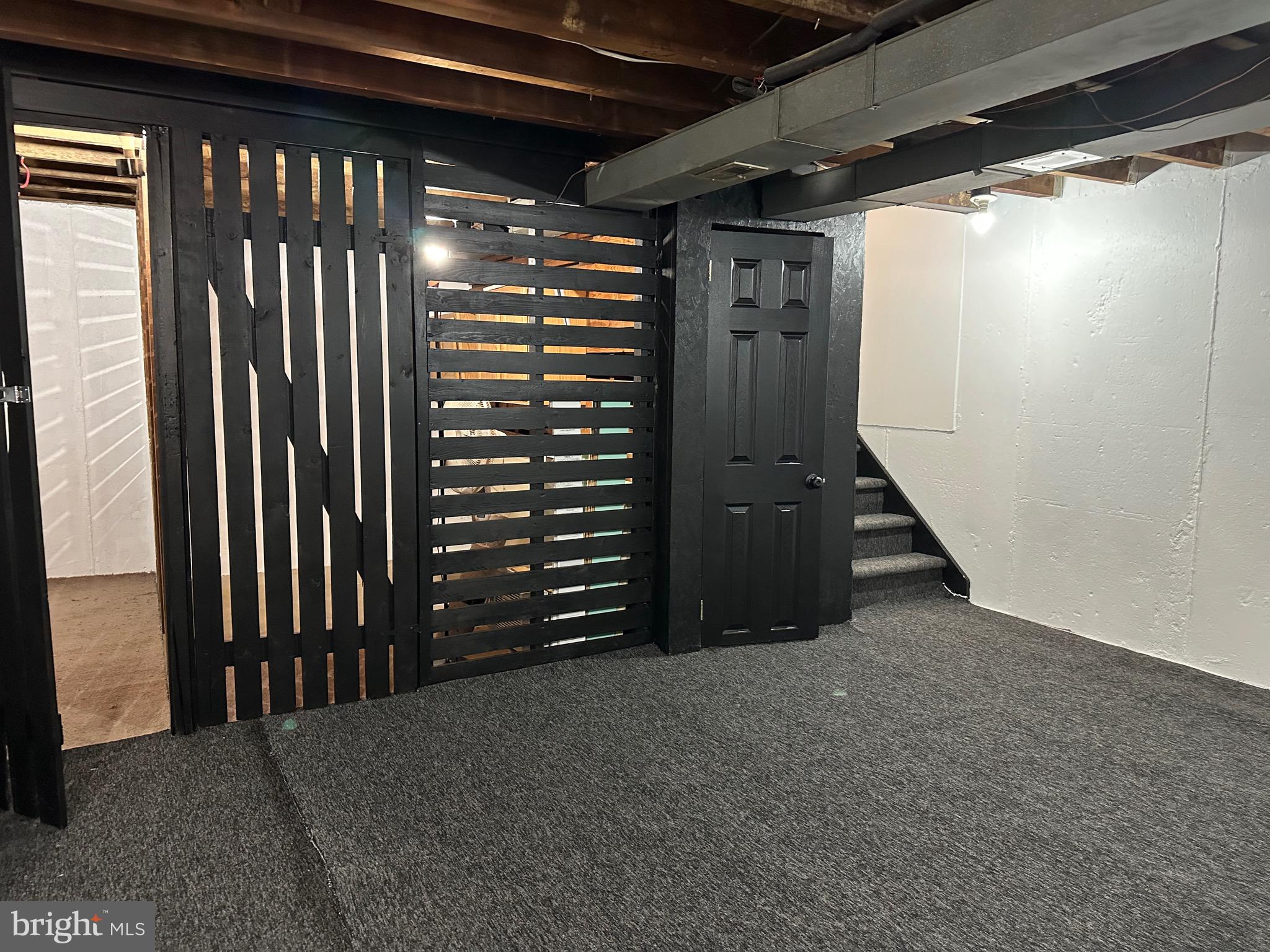 9405 Kirkwood Road Philadelphia, PA 19114 - Photo 57 of 66 a view of an empty room with wooden floor