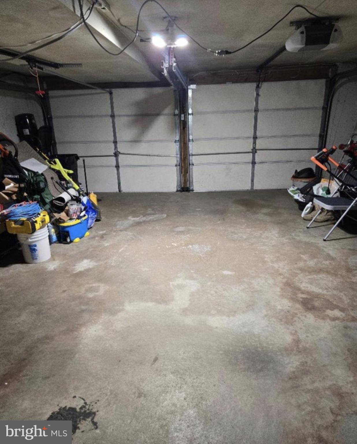 9405 Kirkwood Road Philadelphia, PA 19114 - Photo 63 of 66 a view of a garage with parked cars