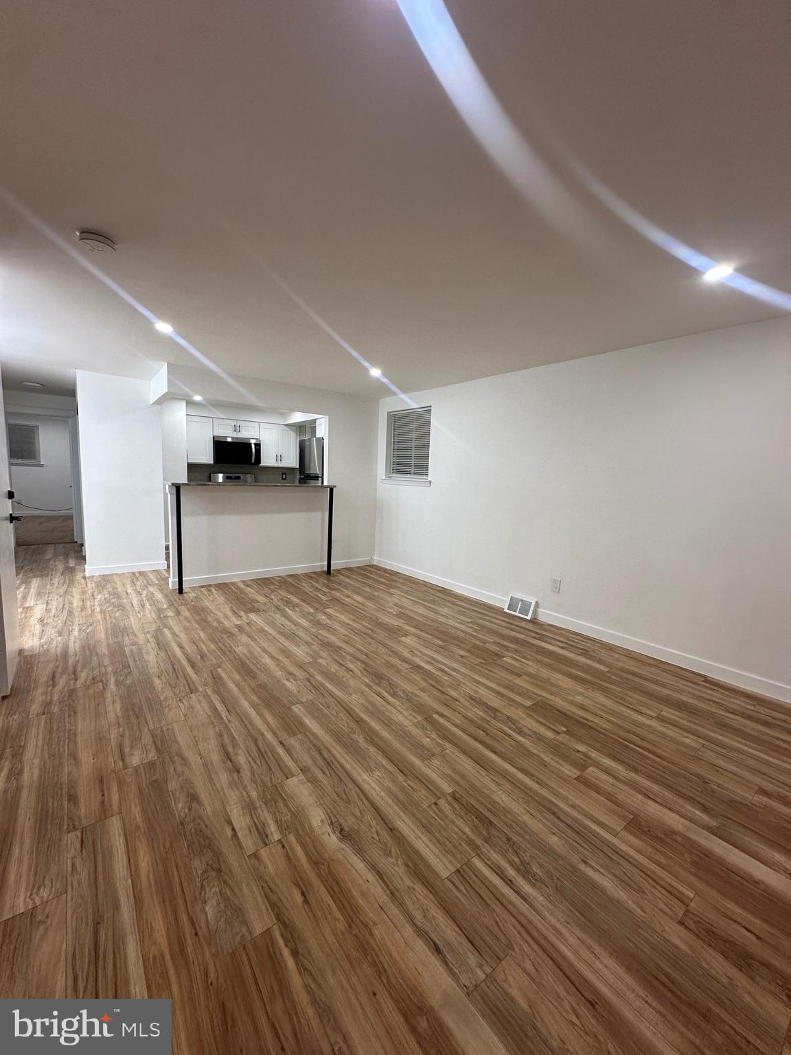 9405 Kirkwood Road Philadelphia, PA 19114 - Photo 9 of 66 a view of empty room with wooden floor
