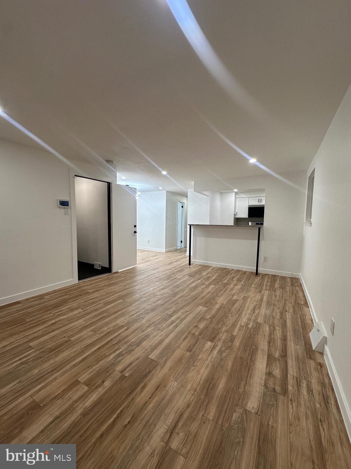 9405 Kirkwood Road Philadelphia, PA 19114 - Photo 10 of 66 a view of empty room with wooden floor
