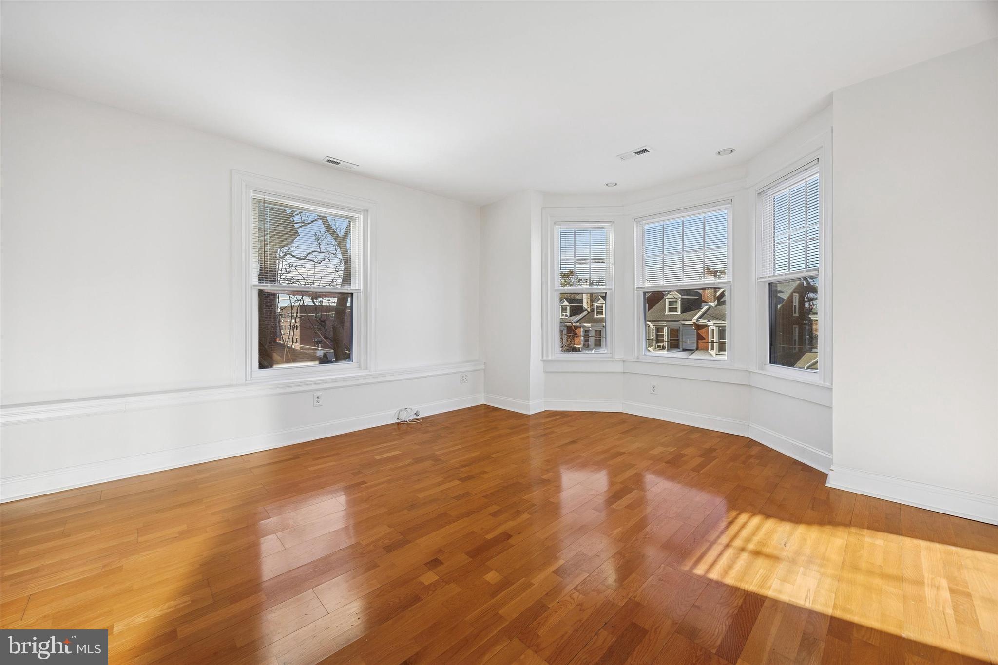5449 Ridge Avenue, Unit 2 Philadelphia, PA 19128 - Photo 5 of 15 a view of an empty room with window