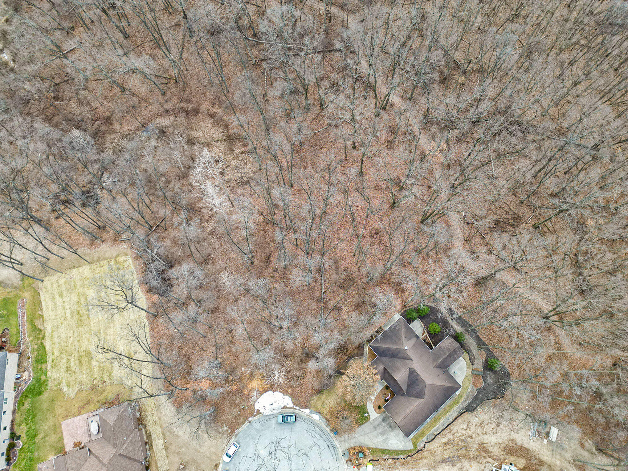 81 Morena Terrace Crown Point, IN 46307 - Photo 6 of 8 a wooden bench sitting in a backyard