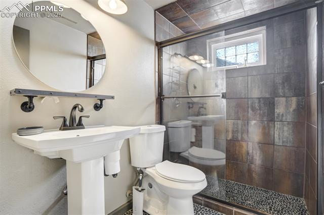 615 Castle Road Colorado Springs, CO 80904 - Photo 41 of 50 Lower-level bathroom