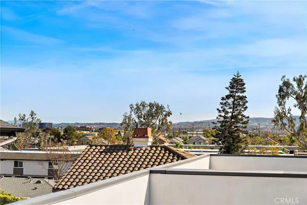 a view of a balcony with an ocean view
