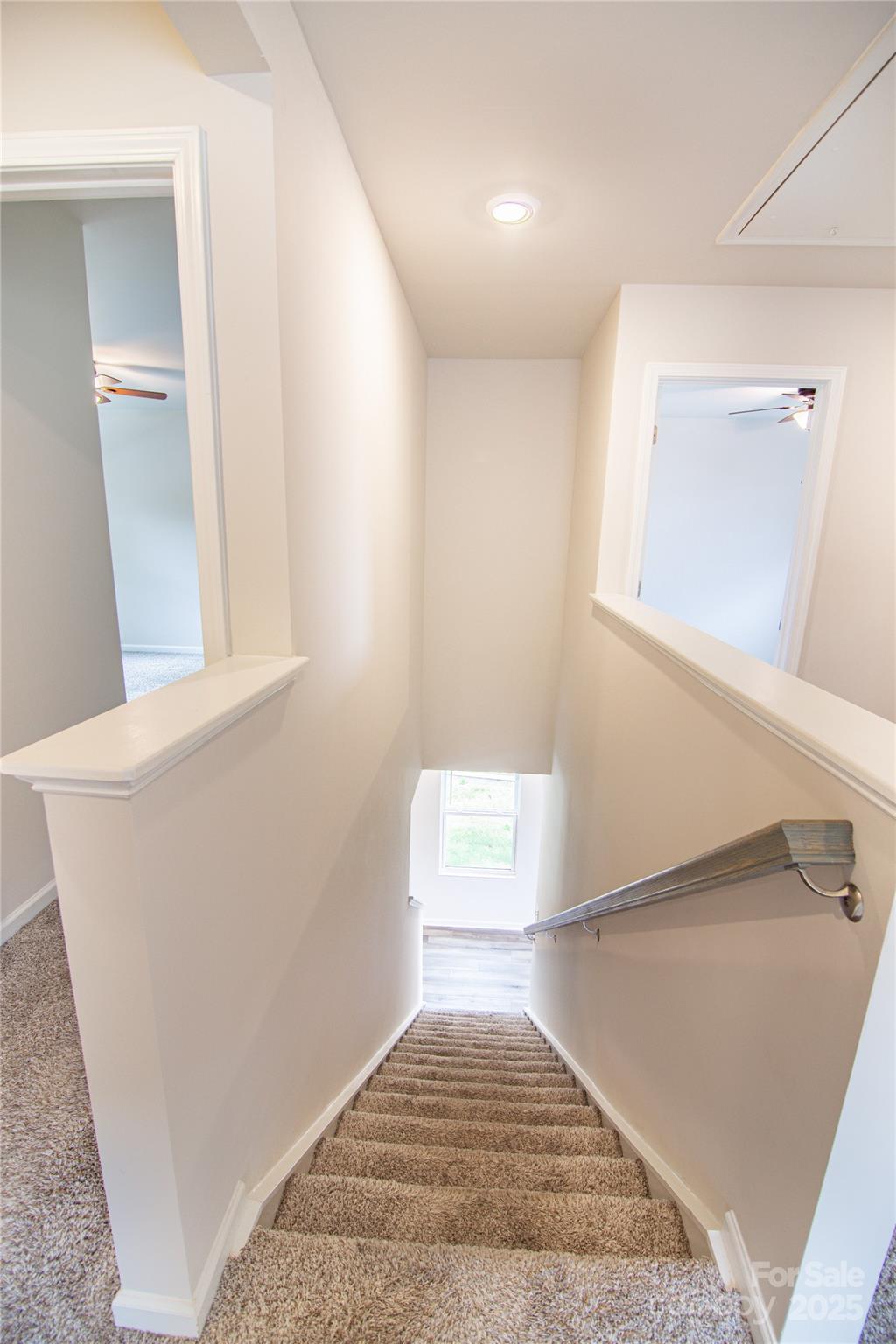 1148 Harland Street, Unit 52 Charlotte, NC 28216 - Photo 20 of 26 a view of an empty room and wooden floor