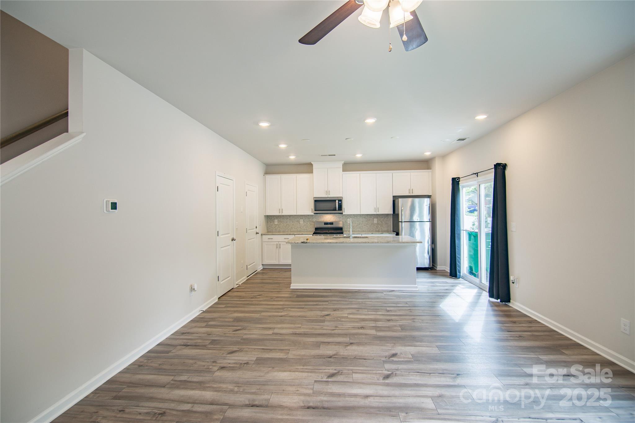 1148 Harland Street, Unit 52 Charlotte, NC 28216 - Photo 5 of 26 a view of a kitchen with a sink