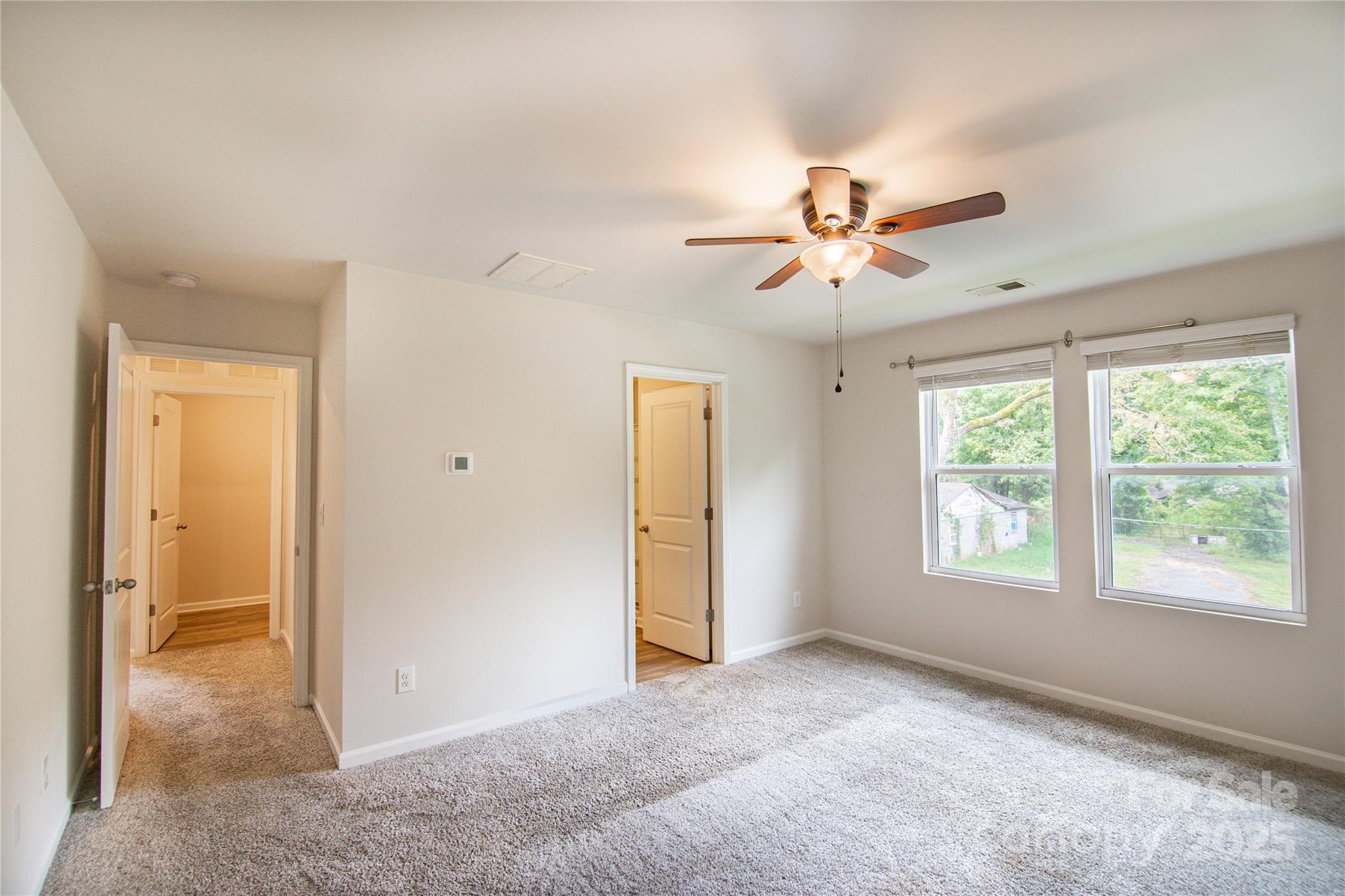 1148 Harland Street, Unit 52 Charlotte, NC 28216 - Photo 9 of 26 a view of an empty room with a window