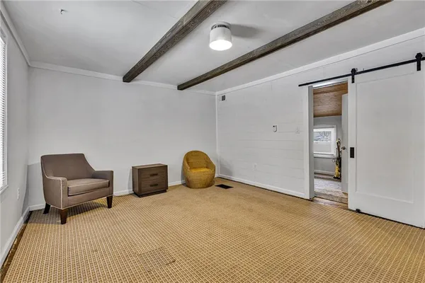 a view of a livingroom with furniture