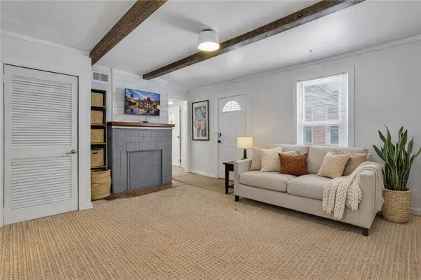 a living room with furniture and a couch