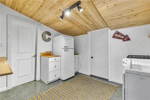 a view of a storage & utility room with closet
