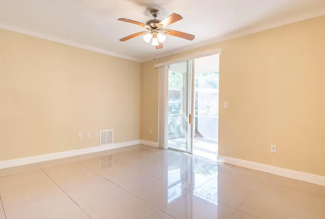a view of an empty room and window