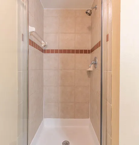 a spacious bathroom with a bathtub