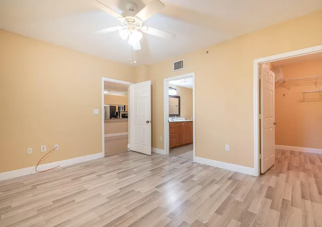 a room with pool table table tennis and a table