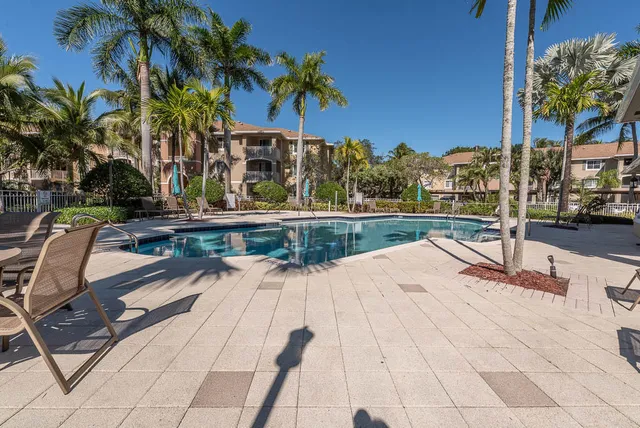 a garden view with a fountain