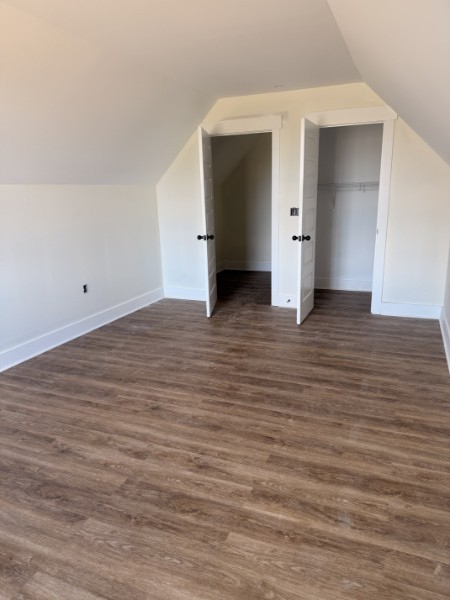 531 Old Hopkinsville Road Cadiz, KY 42211 - Photo 14 of 15 a view of an empty room with wooden floor and closet