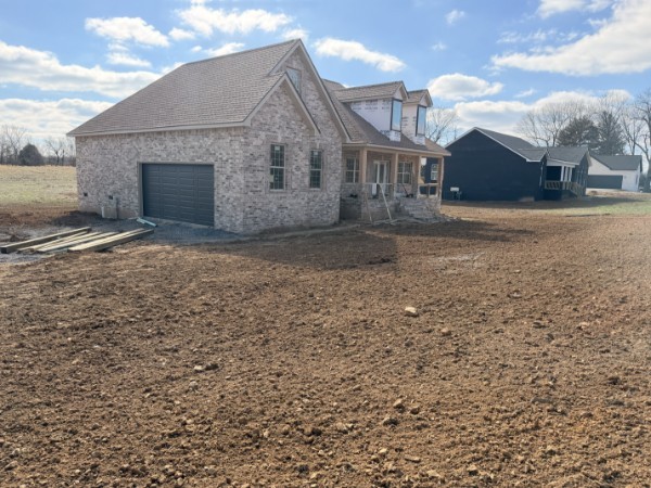 531 Old Hopkinsville Road Cadiz, KY 42211 - Photo 3 of 15 a view of a house with a yard