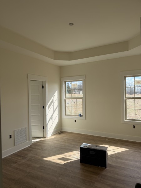 531 Old Hopkinsville Road Cadiz, KY 42211 - Photo 7 of 15 a view of empty room with wooden floor and fan