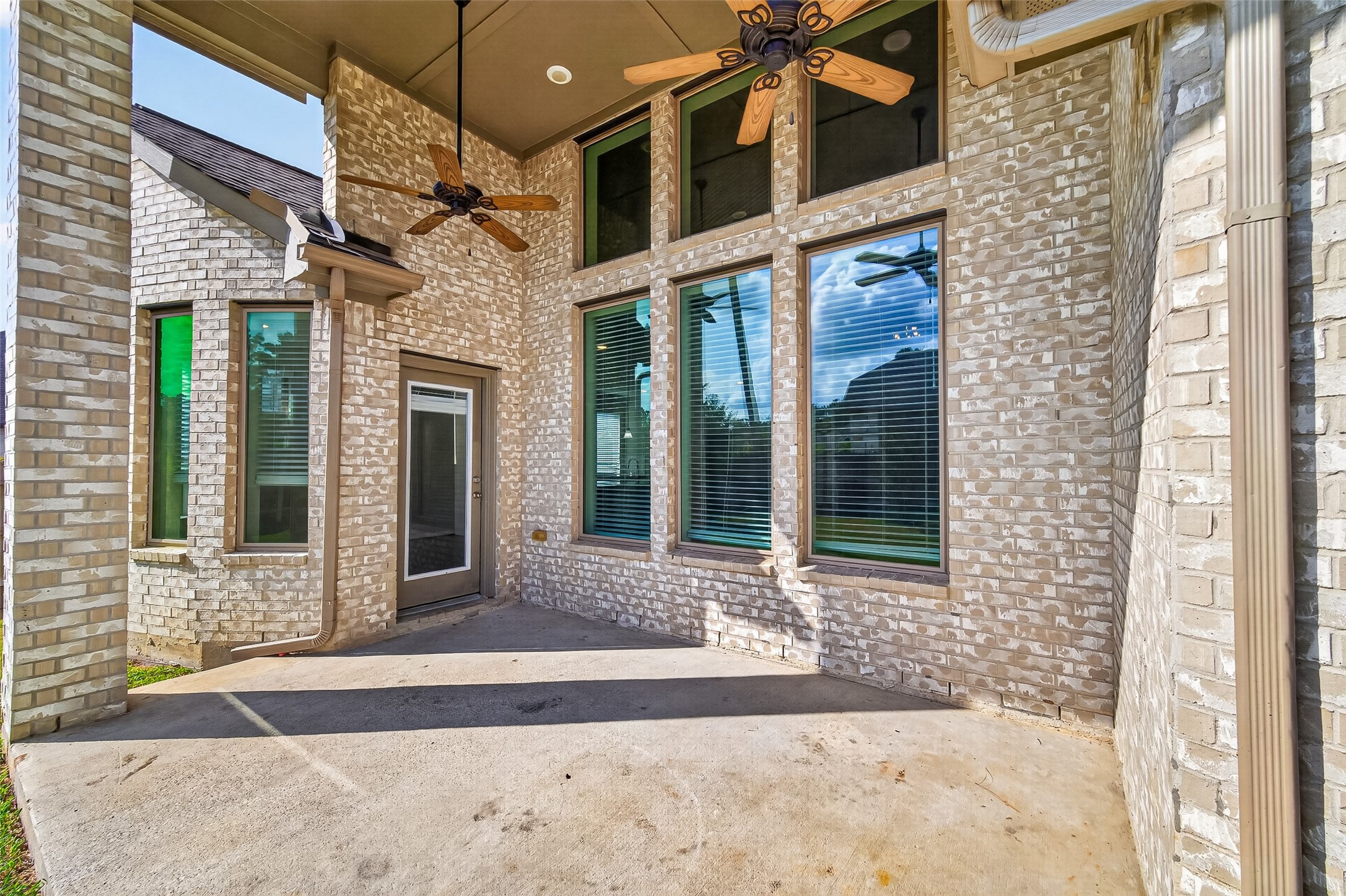 17323 Grand Canyon Road Conroe, TX 77302 - Photo 38 of 40 njoy a separate living space in your home with your covered patio - including ceiling fans!