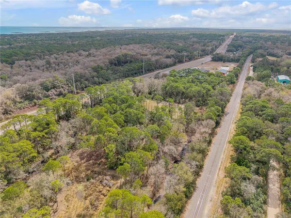 a view of a yard with an outdoor space