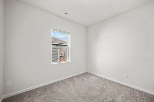 an empty room with a workbench