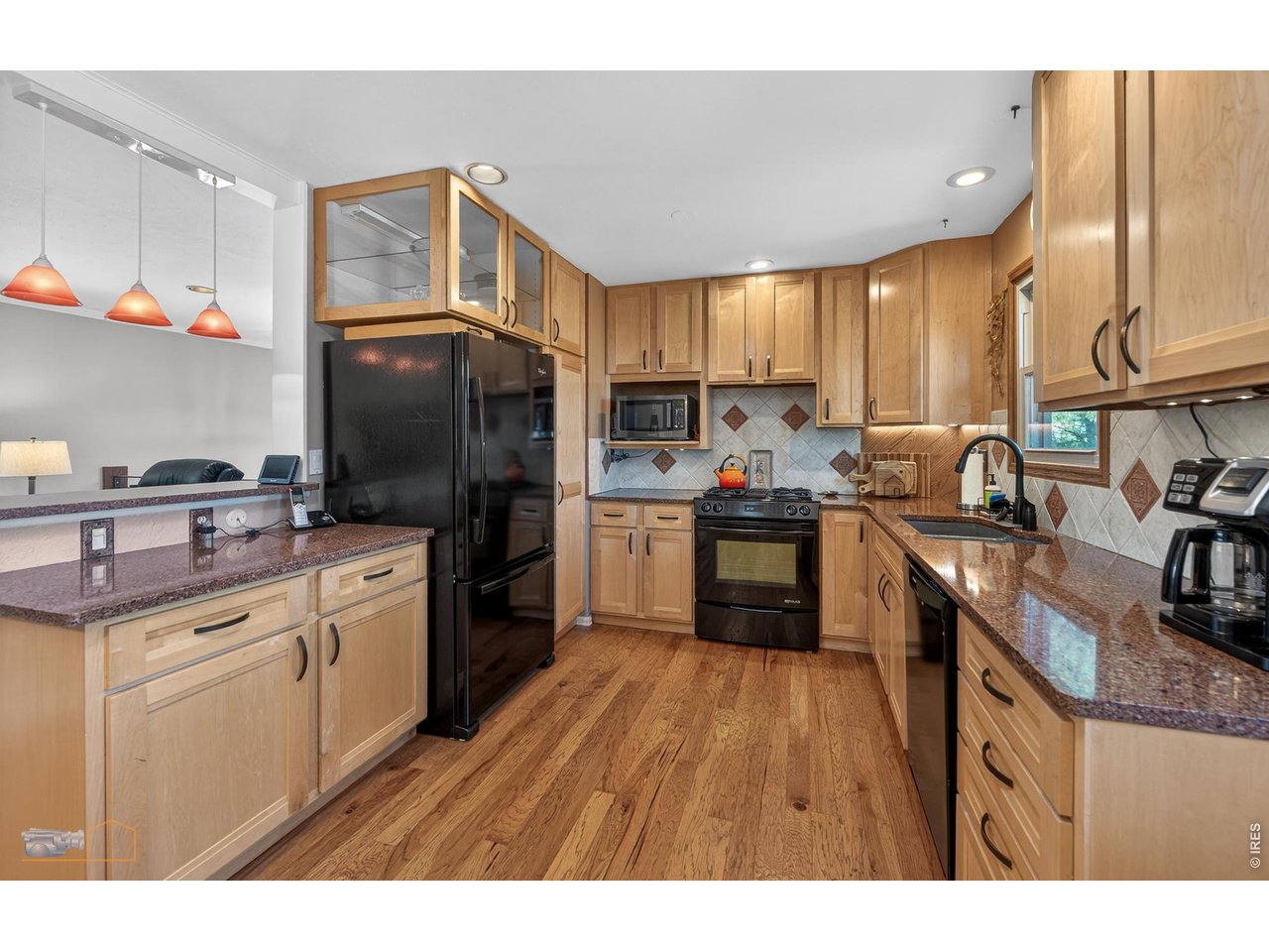 3978 Viewpoint Way Lafayette, CO 80026 - Photo 8 of 41 Updated cabinets with custom pull-out shelving