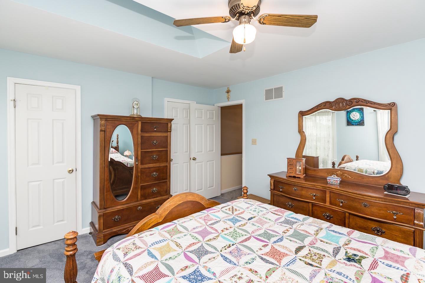 1941 Oak Leaf Lane Holmes, PA 19043 - Photo 17 of 44 a bedroom with a bed and wooden floor