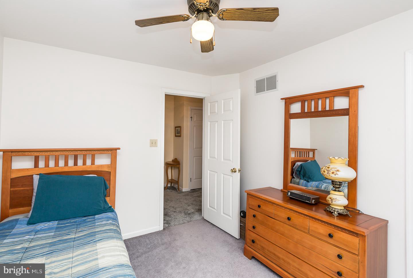 1941 Oak Leaf Lane Holmes, PA 19043 - Photo 24 of 44 a bedroom with a bed and a dresser