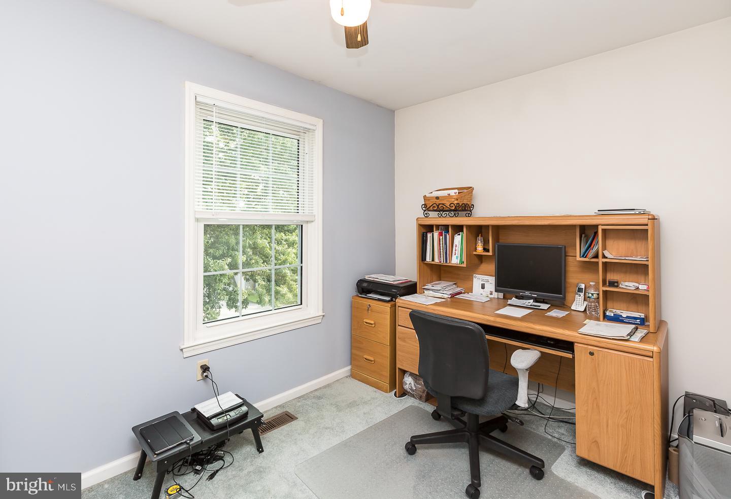 1941 Oak Leaf Lane Holmes, PA 19043 - Photo 25 of 44 a view of a workspace with furniture and a window