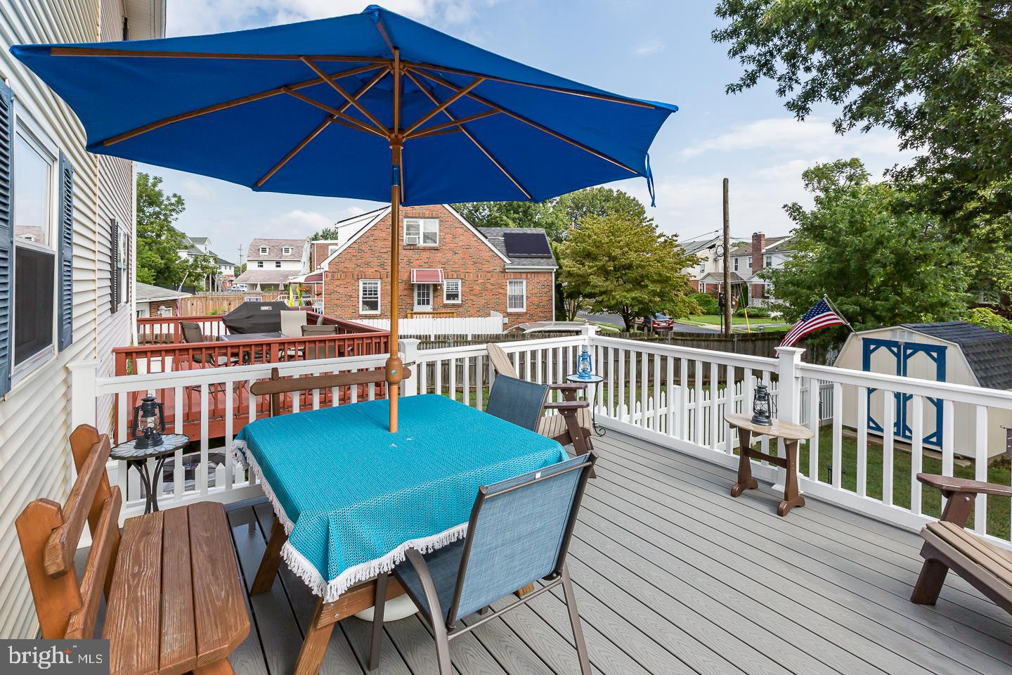 1941 Oak Leaf Lane Holmes, PA 19043 - Photo 36 of 44 a view of a balcony with furniture and wooden deck