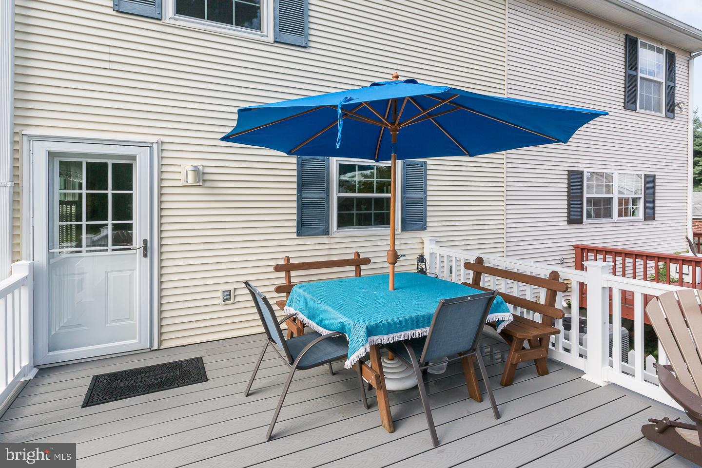 1941 Oak Leaf Lane Holmes, PA 19043 - Photo 37 of 44 a table and chairs in patio of the house