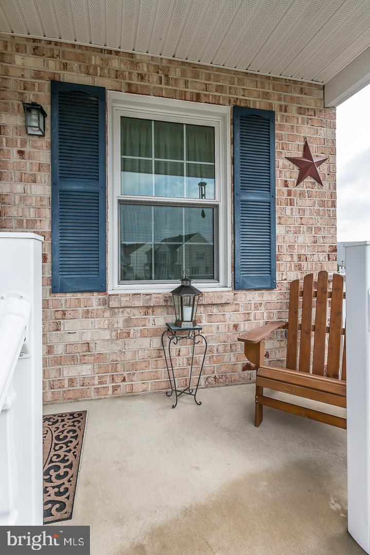 1941 Oak Leaf Lane Holmes, PA 19043 - Photo 5 of 44 a front view of a house with outdoor seating
