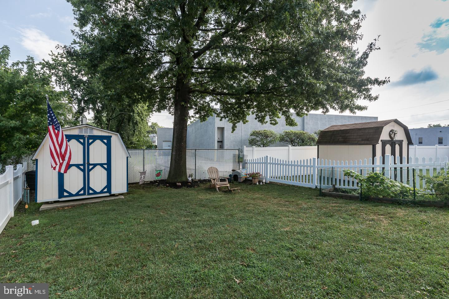 1941 Oak Leaf Lane Holmes, PA 19043 - Photo 43 of 44 a couple of lawn chairs sitting next to a yard