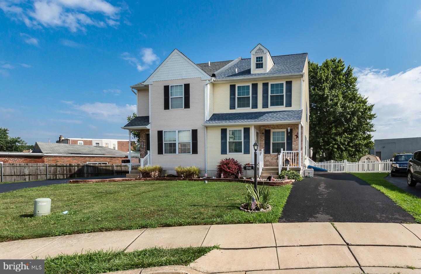 1941 Oak Leaf Lane Holmes, PA 19043 - Photo 44 of 44 a front view of a house with a yard