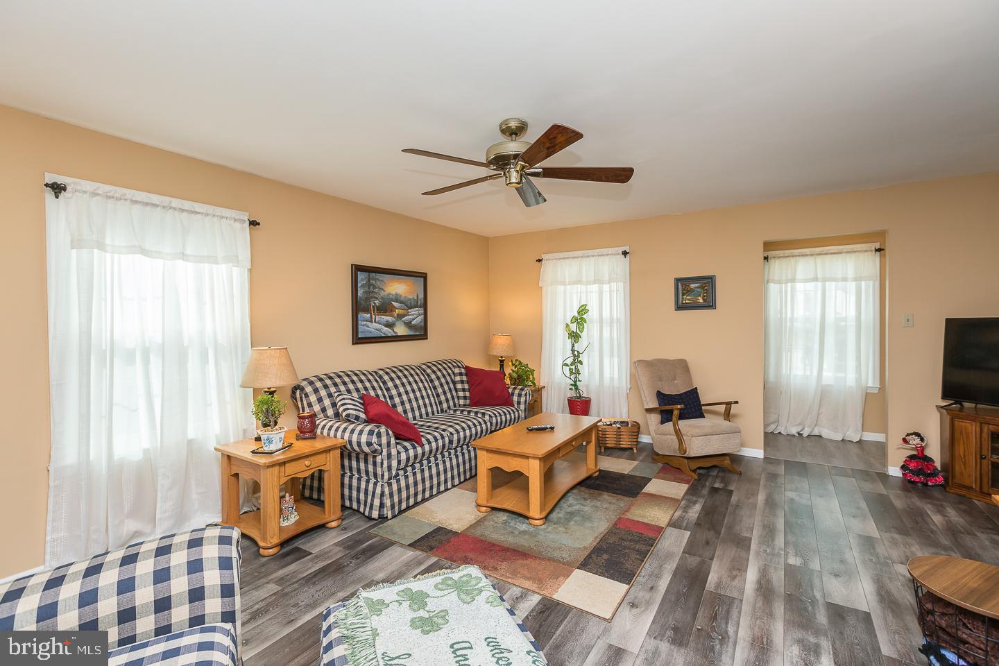 1941 Oak Leaf Lane Holmes, PA 19043 - Photo 9 of 44 a living room with furniture and a flat screen tv