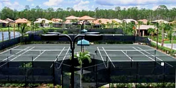 a view of a patio with swimming pool table and chairs