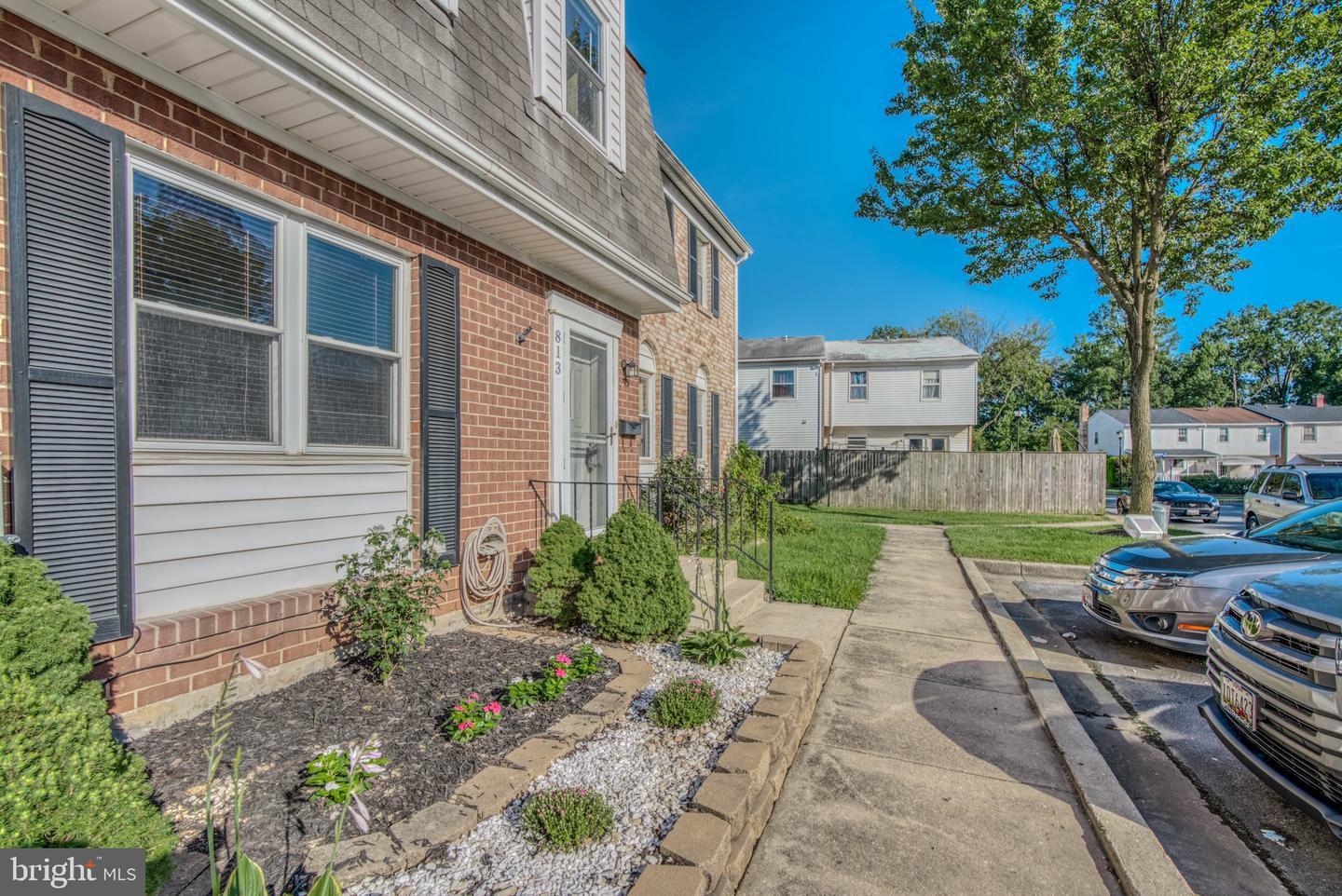 813 Thimbleberry Road, Unit 813 Baltimore, MD 21220 - Photo 3 of 32 Virtual: townhouse with potential lush landscaping