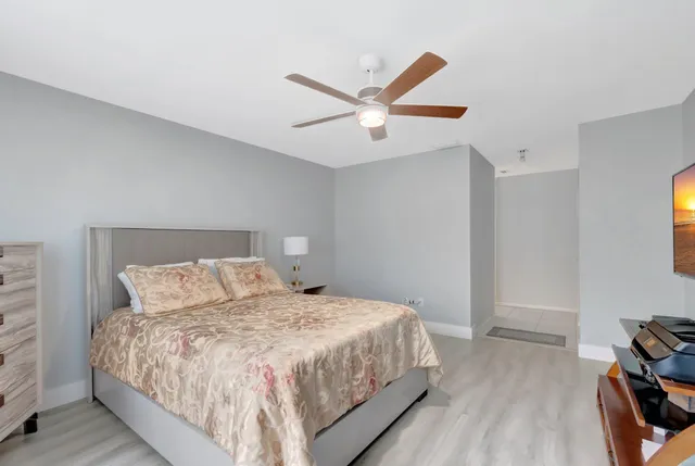 a bathroom with a sink double vanity and a mirror