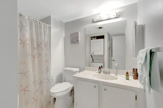 a close up of a sink and a mirror