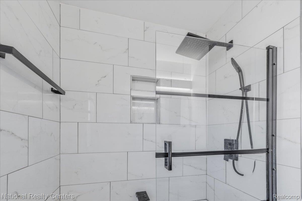 18051 Reed Street Melvindale, MI 48122 - Photo 14 of 35 Bathroom view of a tile shower