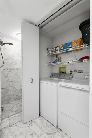 a kitchen with a refrigerator and cabinets