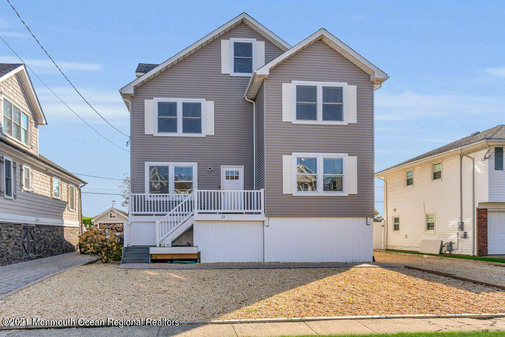 32 Niblick Street Point Pleasant Beach, NJ 08742 - Photo 1 of 38 a view of a house with a yard