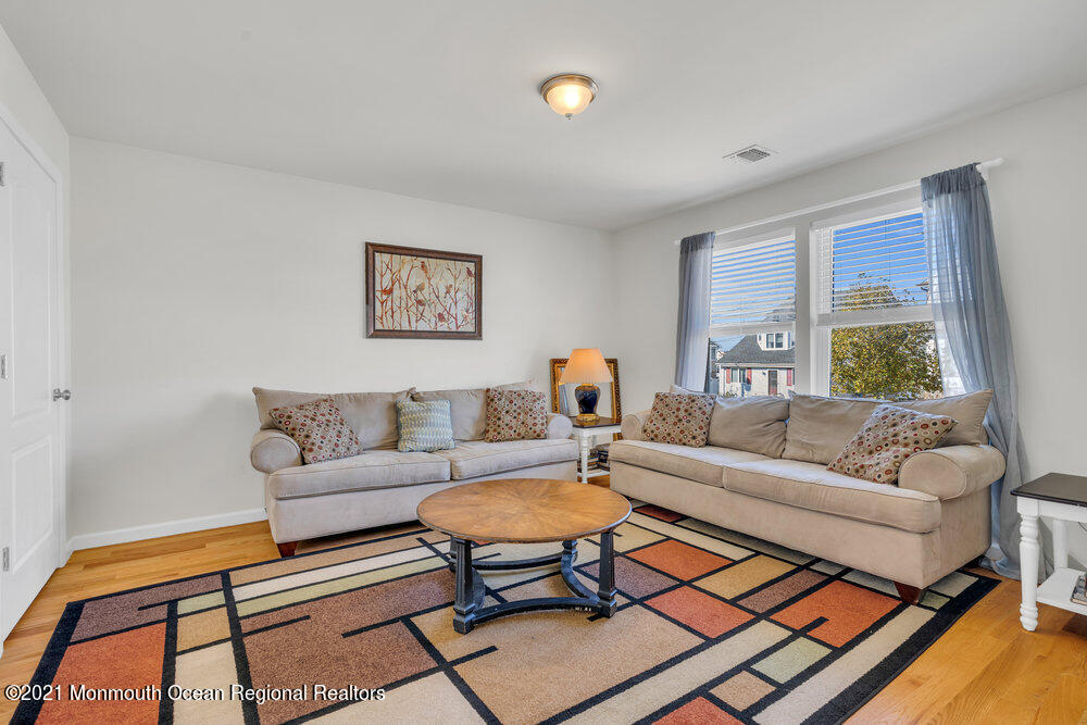 32 Niblick Street Point Pleasant Beach, NJ 08742 - Photo 18 of 38 a living room with furniture and a large window