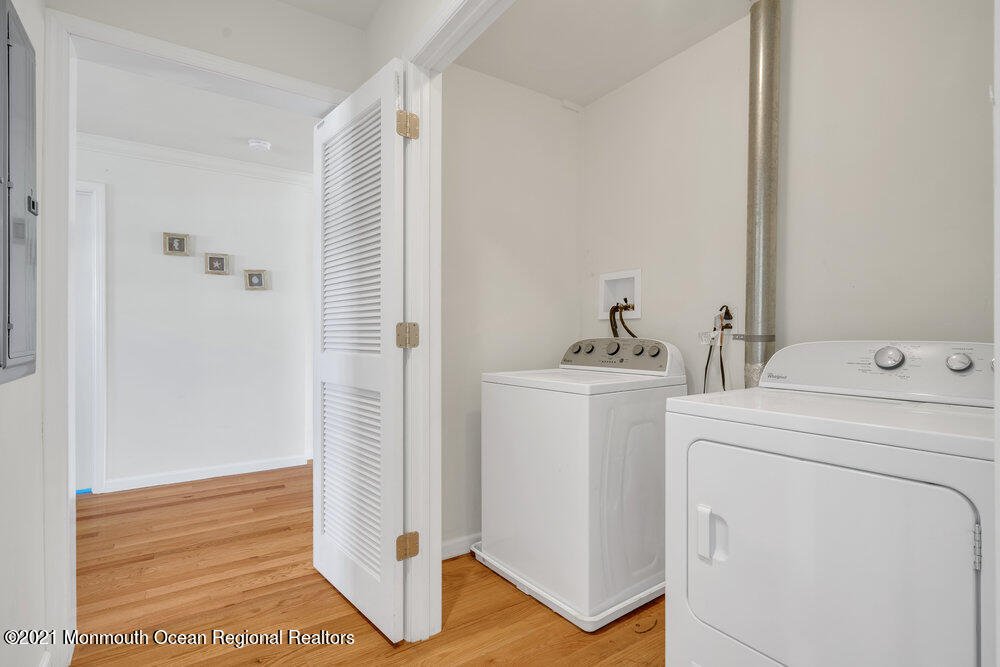 32 Niblick Street Point Pleasant Beach, NJ 08742 - Photo 19 of 38 a bathroom with a sink and a mirror