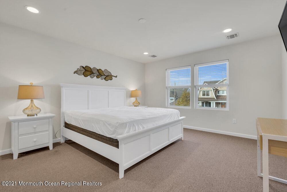 32 Niblick Street Point Pleasant Beach, NJ 08742 - Photo 26 of 38 a spacious bedroom with a bed and window