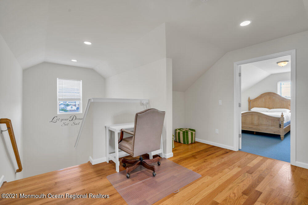 32 Niblick Street Point Pleasant Beach, NJ 08742 - Photo 32 of 38 a view of a workspace with furniture and a bedroom
