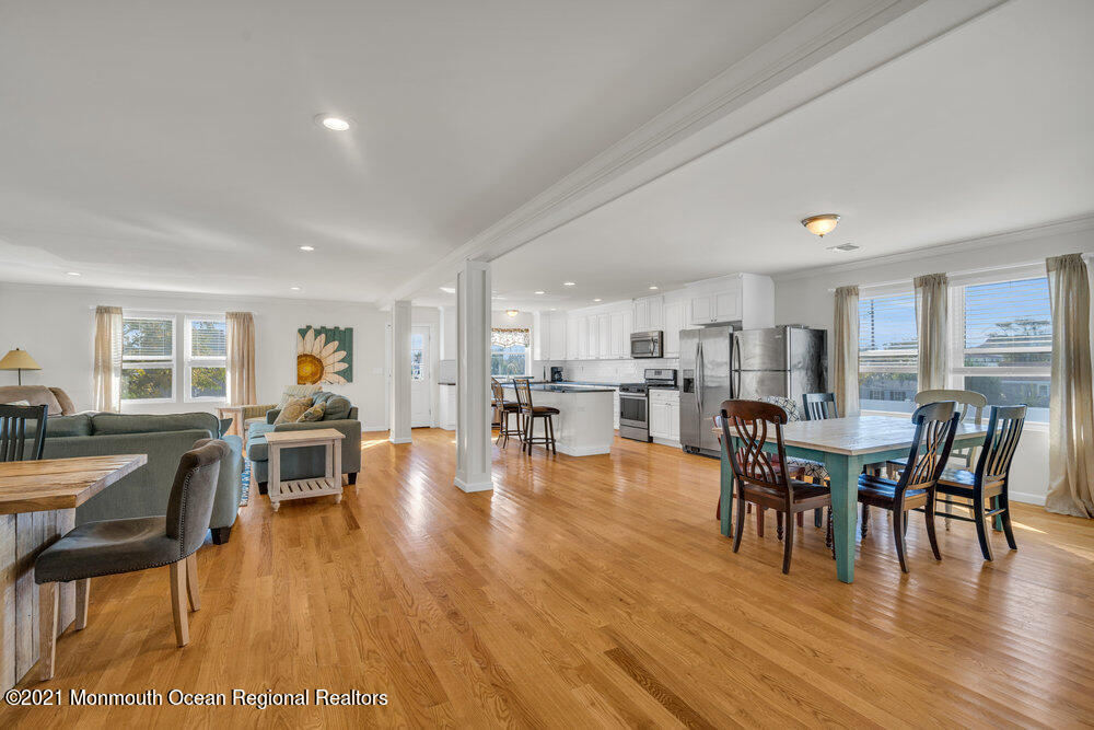 32 Niblick Street Point Pleasant Beach, NJ 08742 - Photo 5 of 38 a view of a dining room with furniture and wooden floor